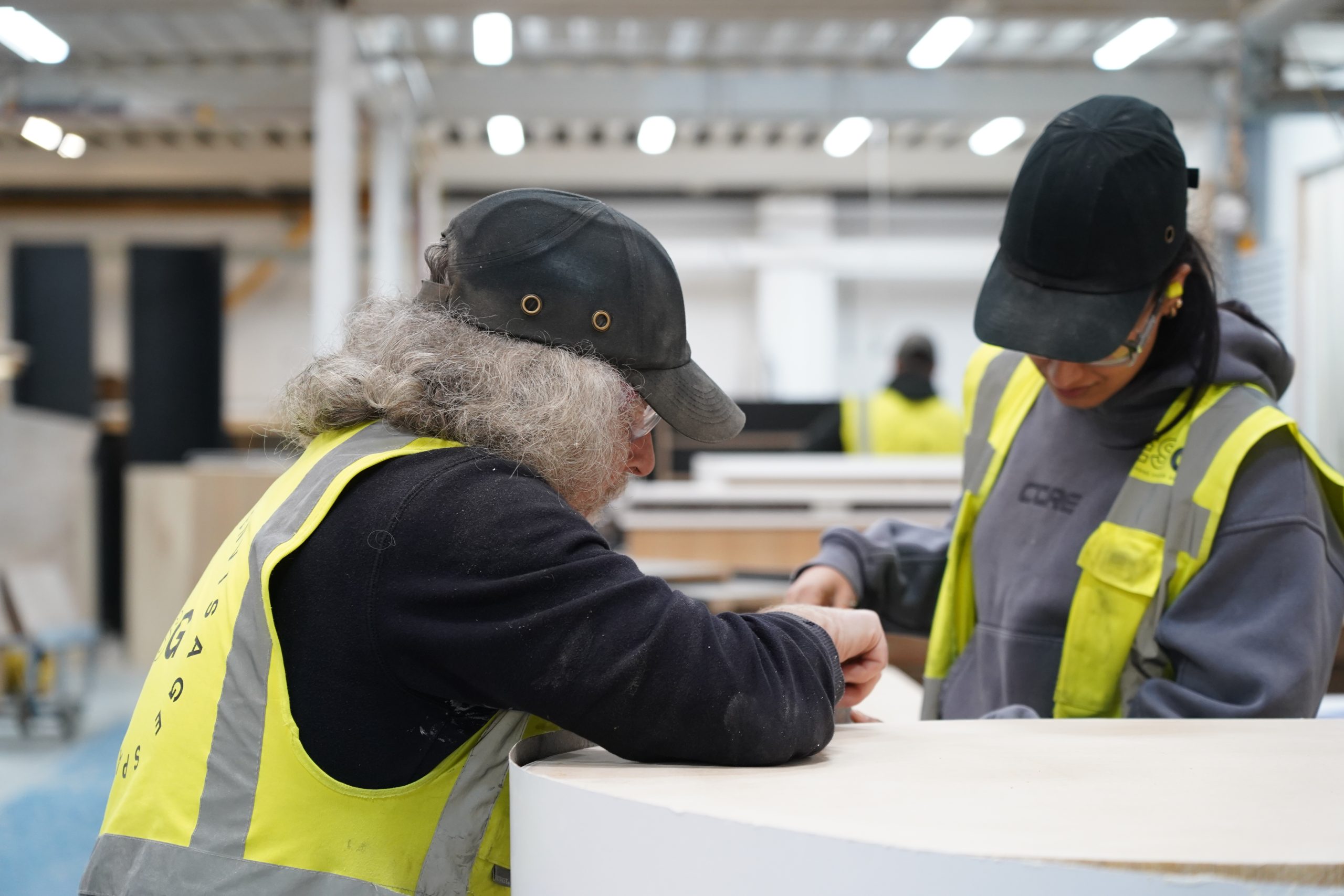 Team working on bespoke shelving
